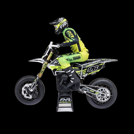 A remote control motorcycle toy with a green and black color scheme, featuring a rider figure in a similar color scheme.