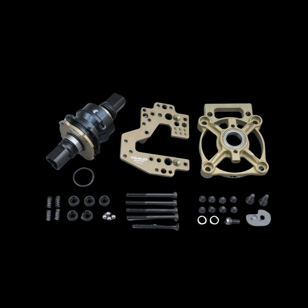 A 2-Speed Transmision Kit consisting of various mechanical parts laid out on a black background, including gears and bolts.