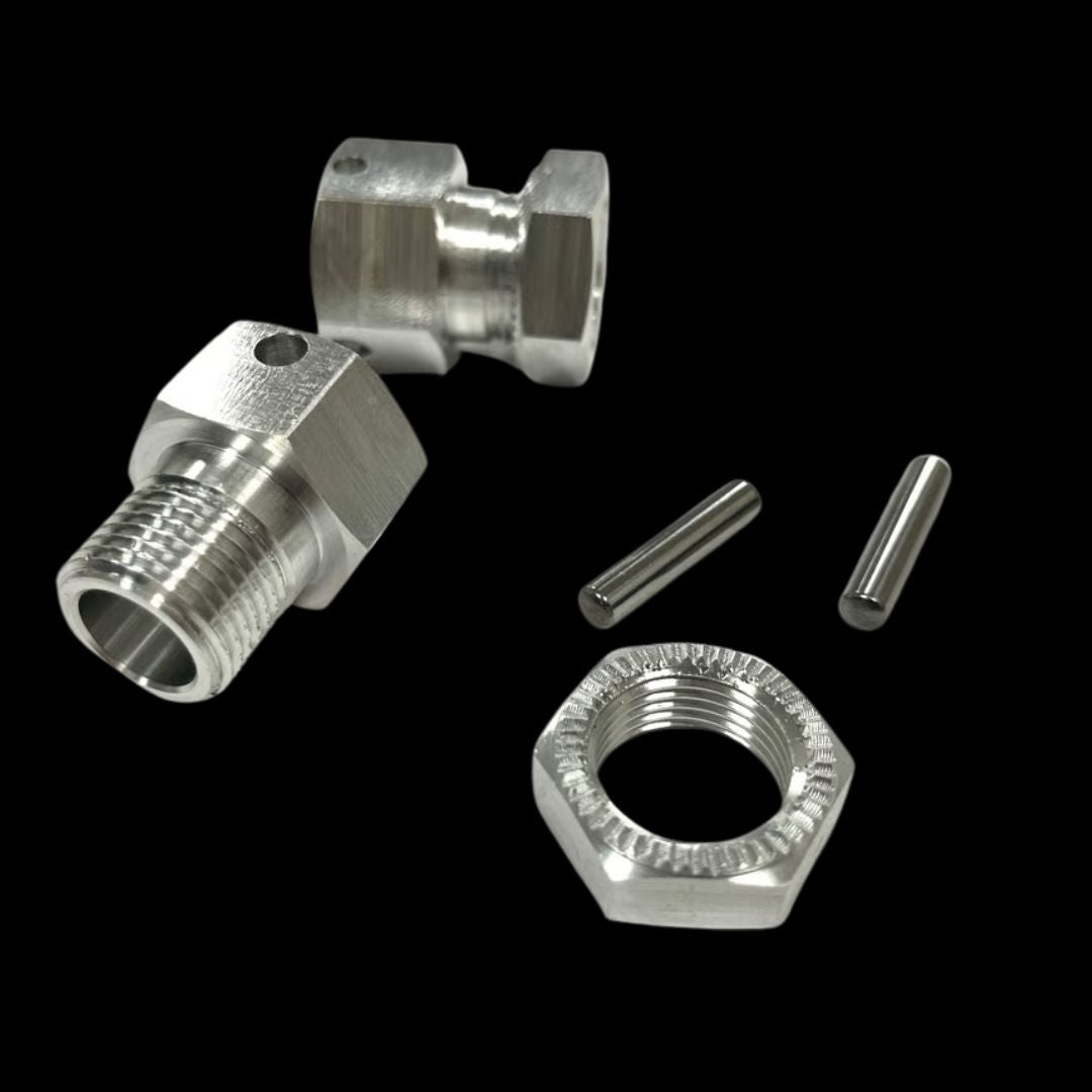 Set of metal hardware components on a black background