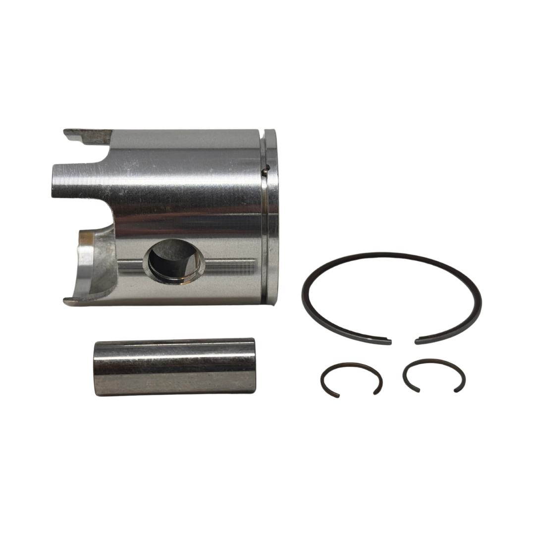 Mechanical components including a cylindrical metal part and two spring washers on a white background