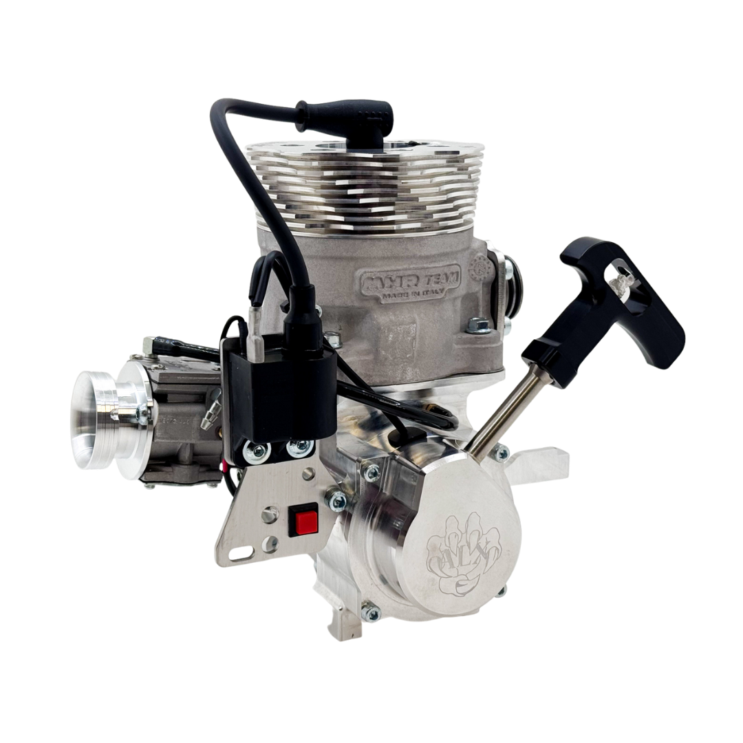 Metallic engine block with various components on a white background
