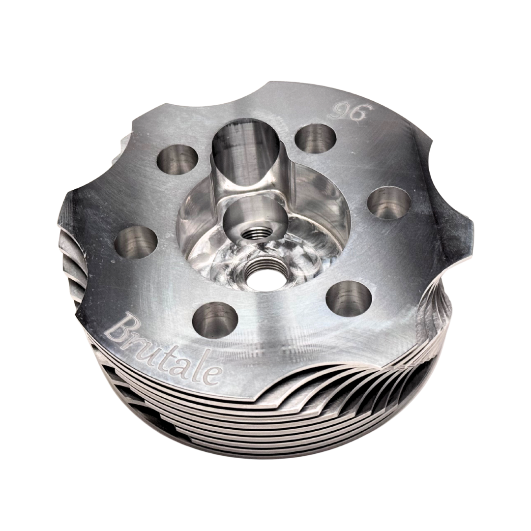 Metal engine cylinder head with 'Brutale' branding on a white background
