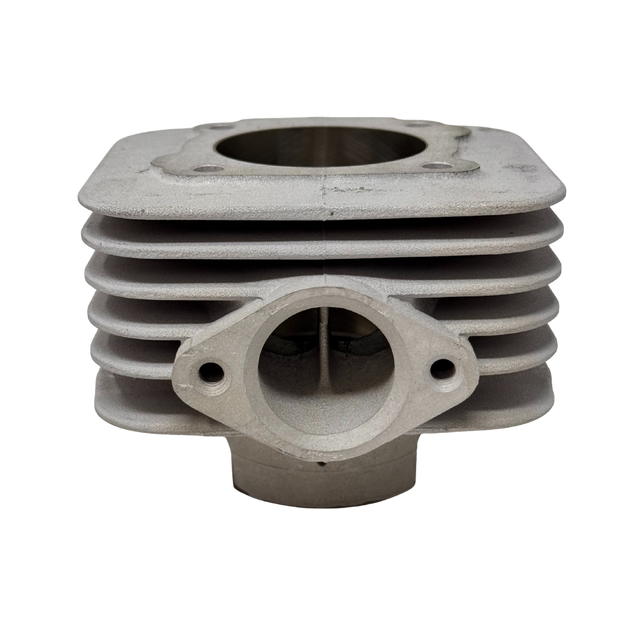 Metal engine cylinder block on a white background