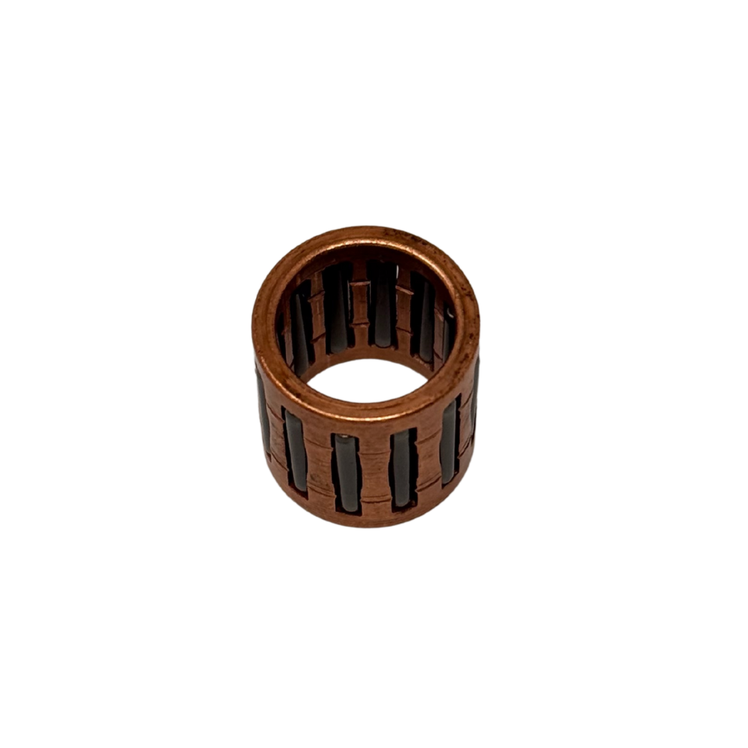 Copper metal ring with black grooves on a white background