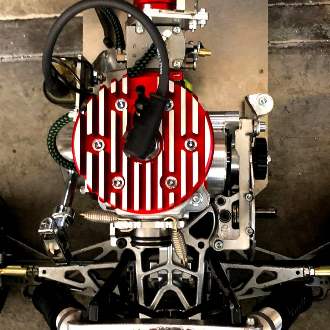 Close-up of a mechanical engine with a red and silver design