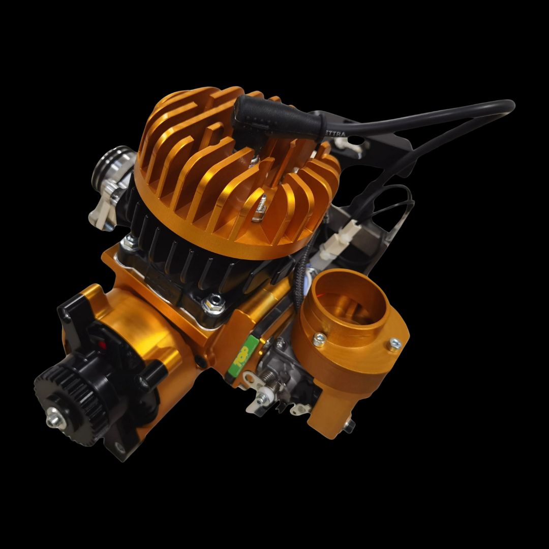 Engine with orange and black components on a black background