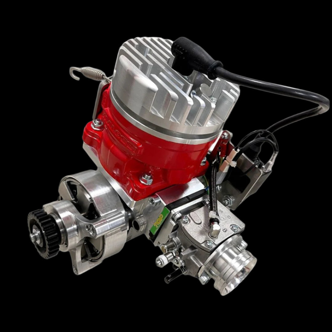 Engine block with red and silver components on a black background