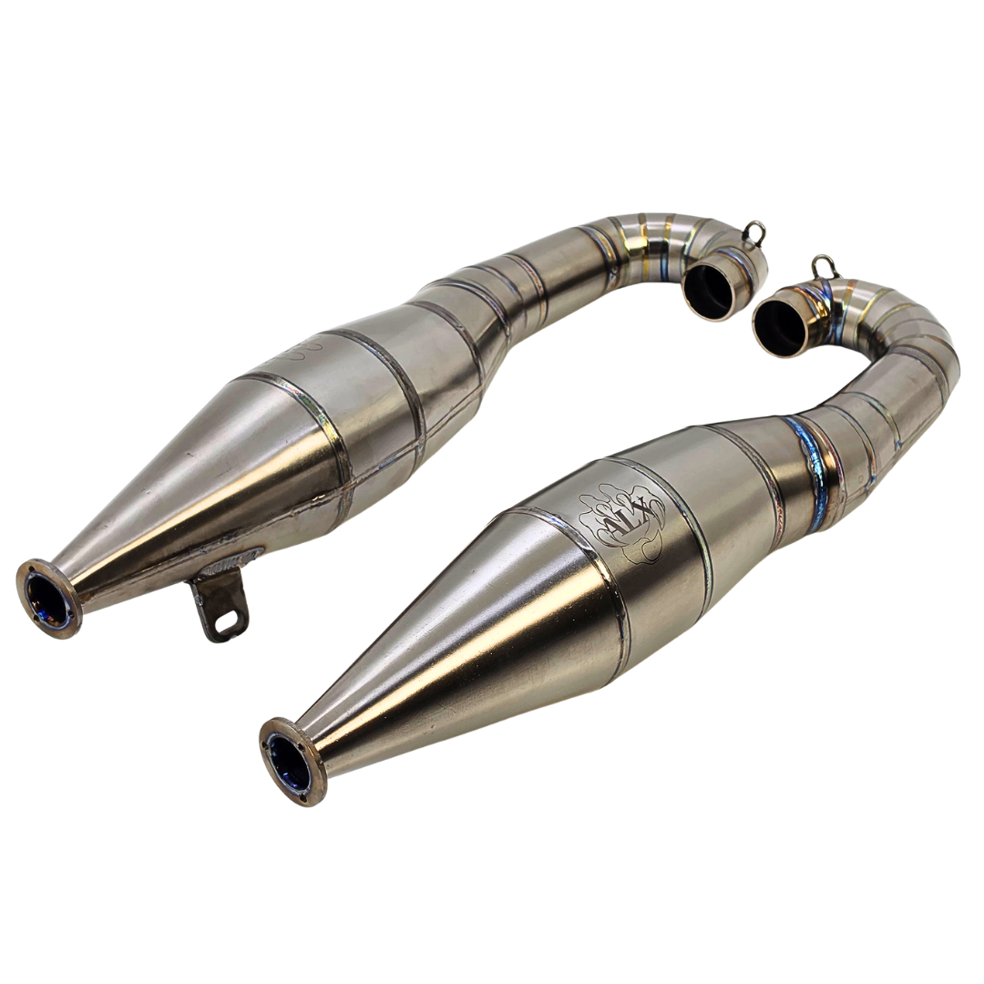 Pair of ALX titanium 80-100cc custom Baja twin exhaust pipes shown at an angle with ALX logo etching
