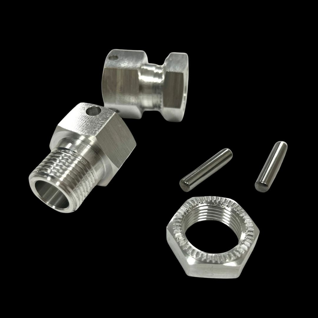 Metallic hardware components including two threaded fittings, a hex nut, and two pins on a black background.