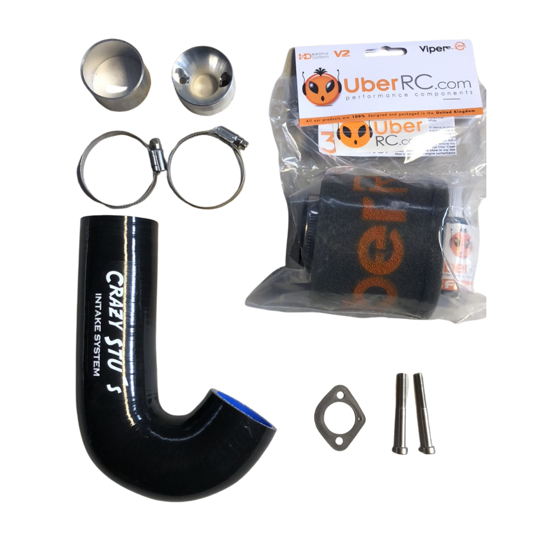 Collection of car parts including a black silicone hose, metal clamps, and packaging on a white background.