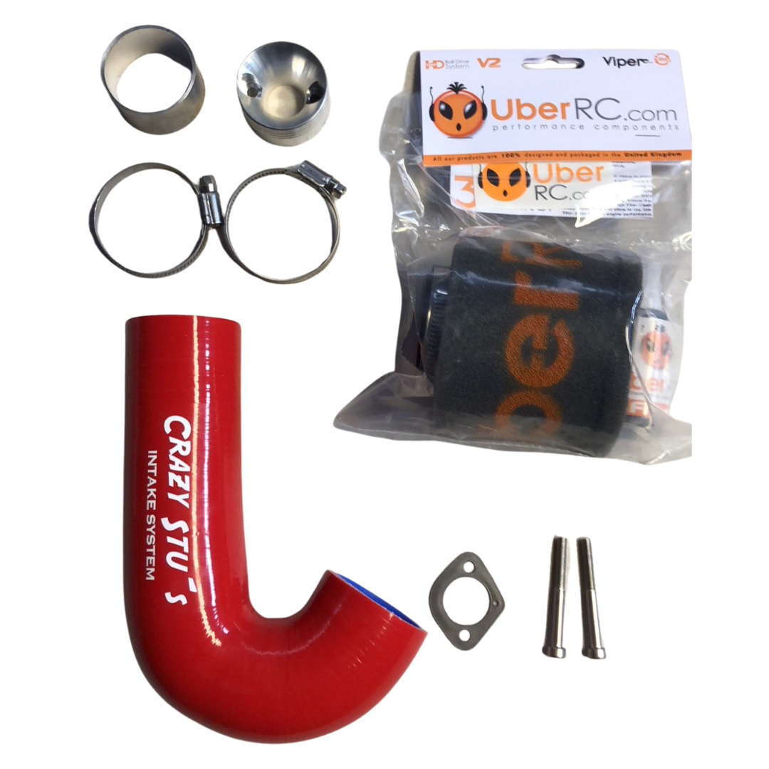 Collection of automotive parts including a red intake tube, clamps, and a package labeled 'Uber RC' on a white background.