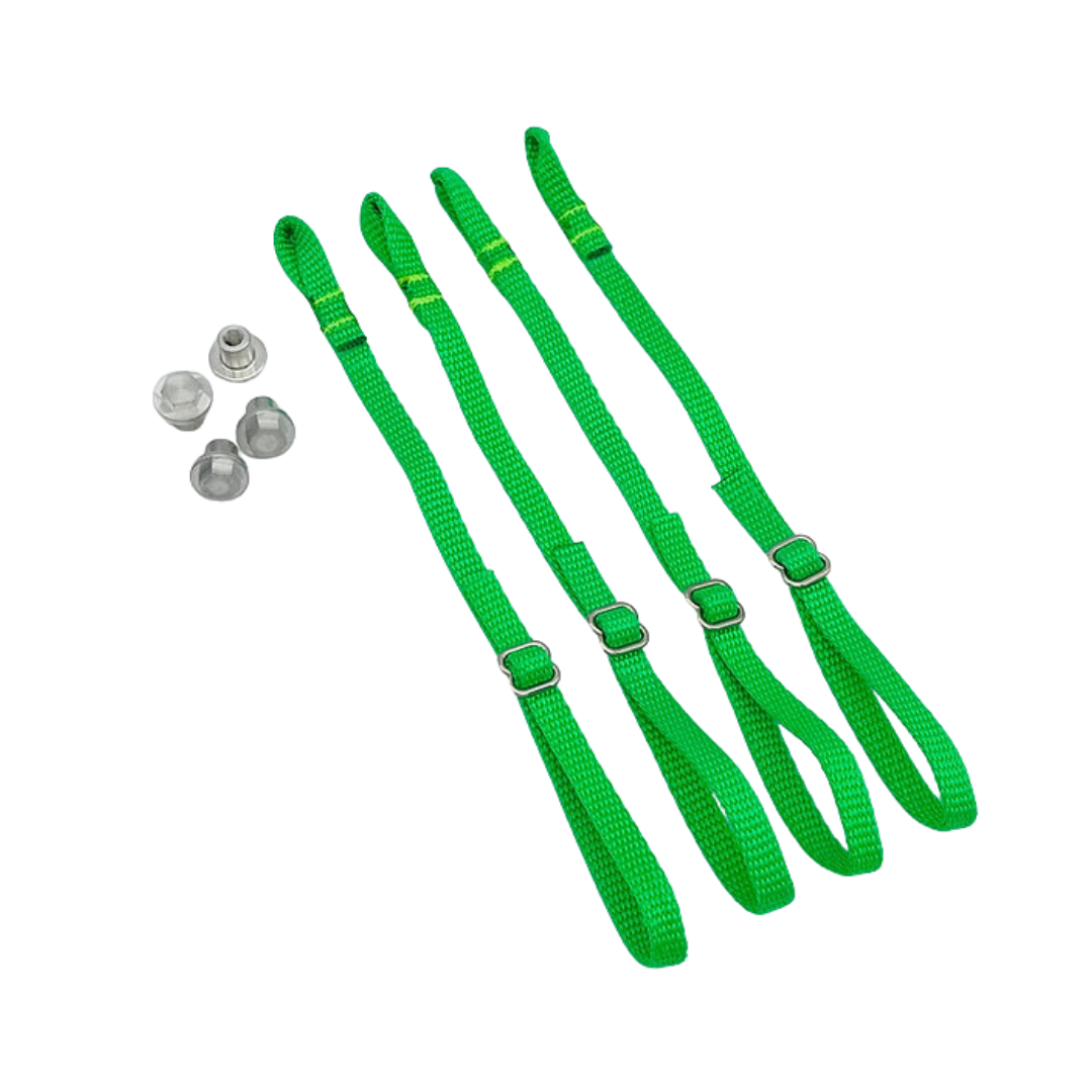 Green straps with metal buckles on a white background