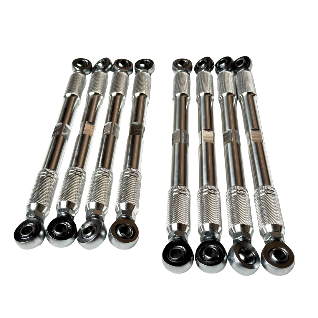 Eight metallic ball-joint bearing extensions arranged in two groups of four on a plain white background.