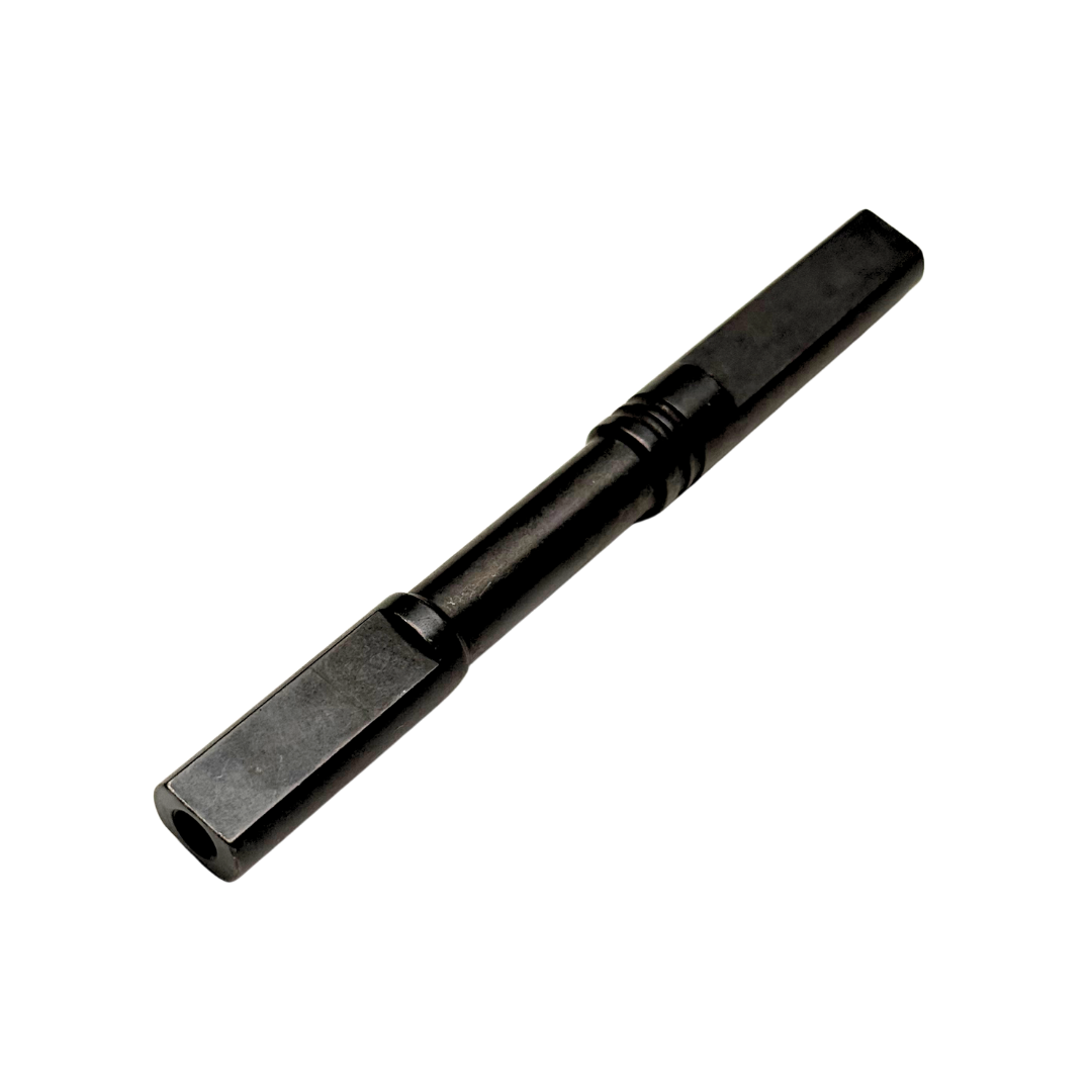 Black metal tool bit on a white background