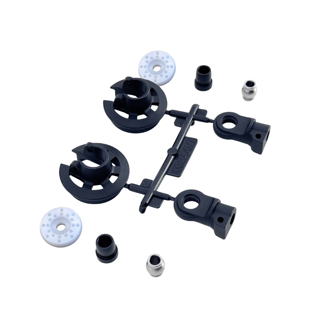 Set of replacement shock components on a white background