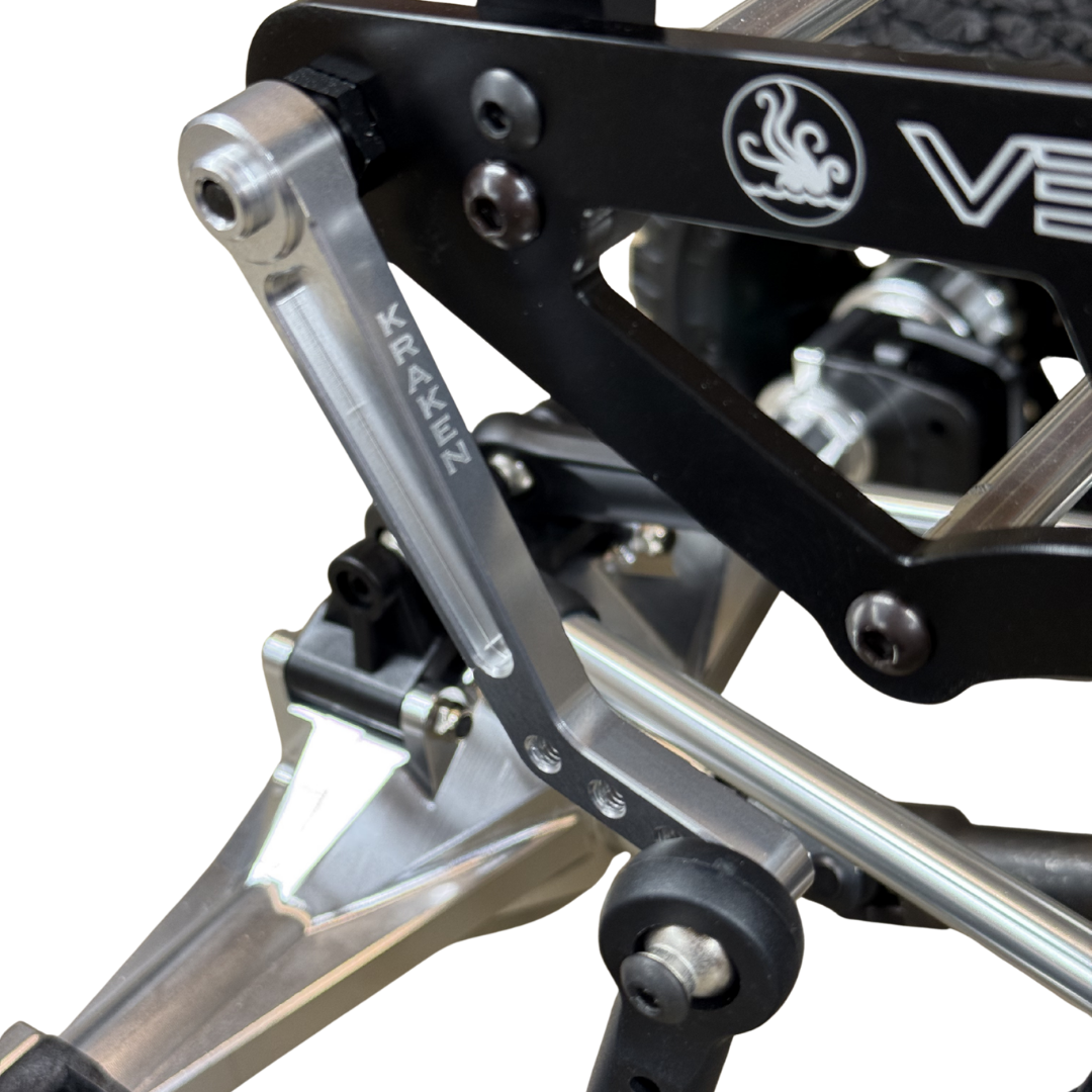 Close-up of a mechanical component with 'VEKTA' branding on a white background