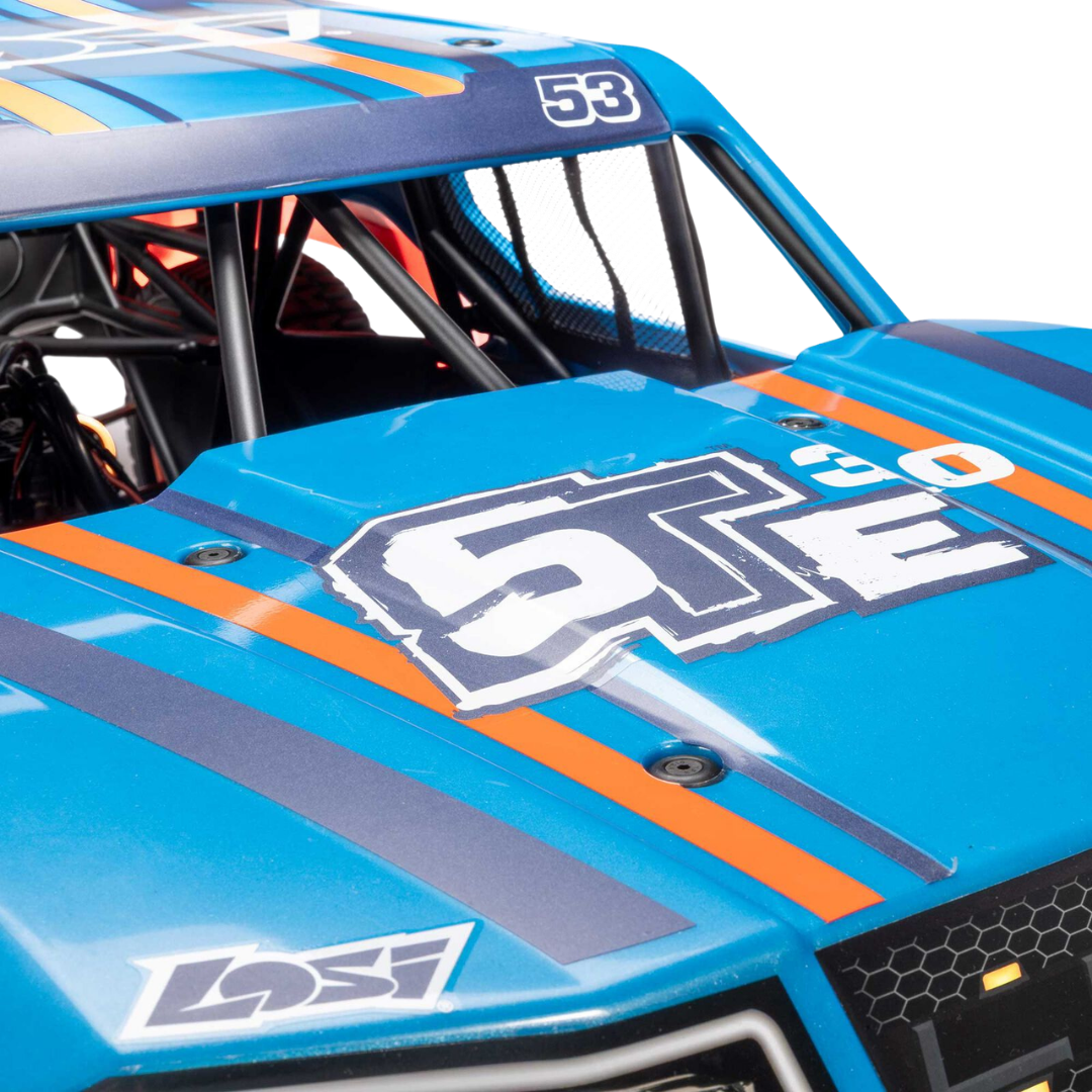 Close-up of a blue off-road vehicle with '5TE' and 'LOSI' branding.