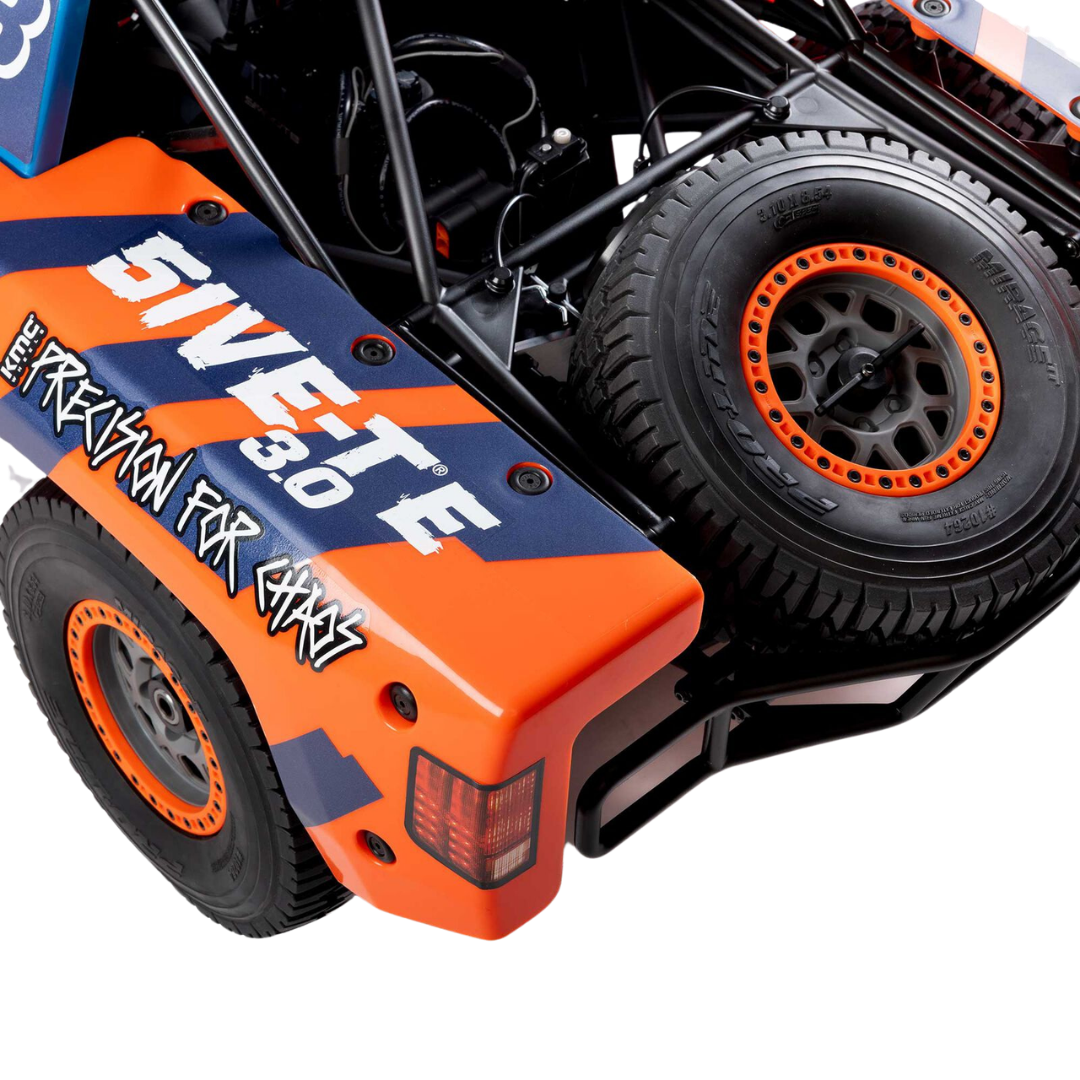 Close-up of a remote control car with '5IVET' branding on an orange and black body.