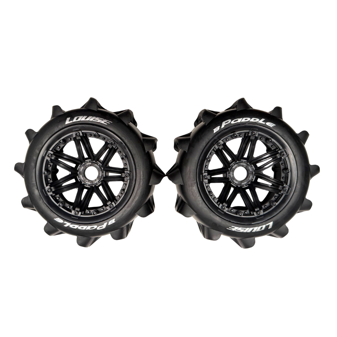 Two black rc car wheels with visible branding on a white background