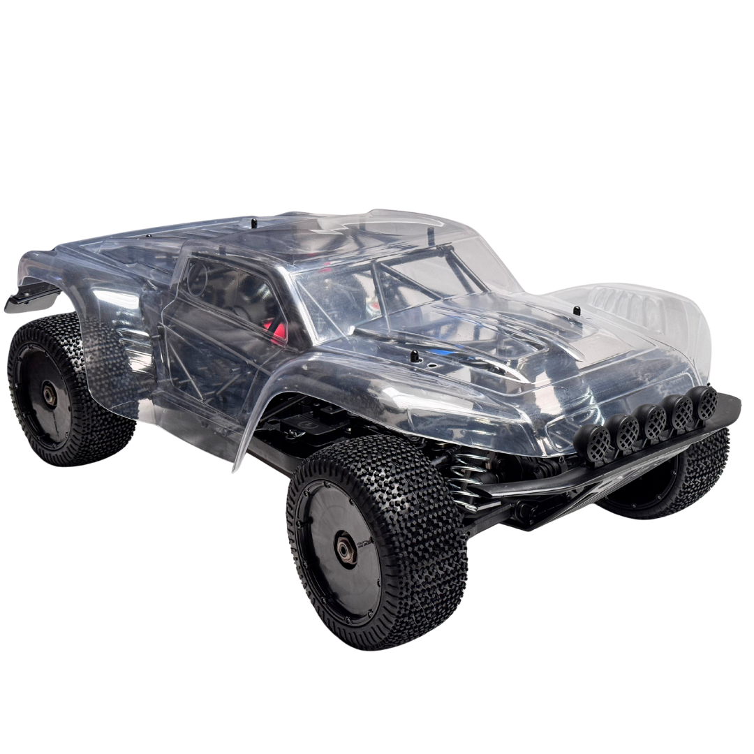 Clear off-road RC car with black tires on a white background