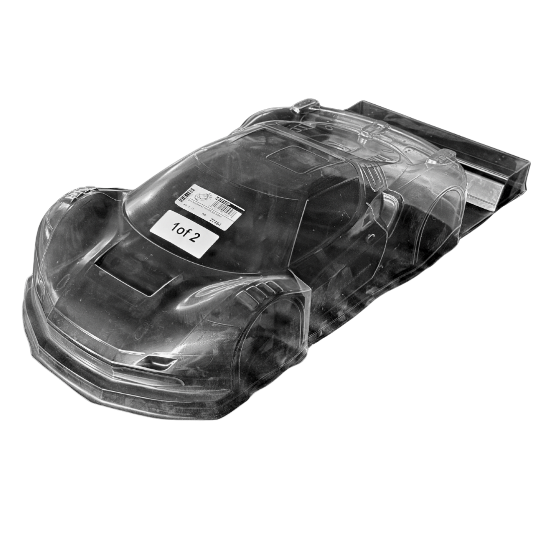 Clear plastic model car body on a white background