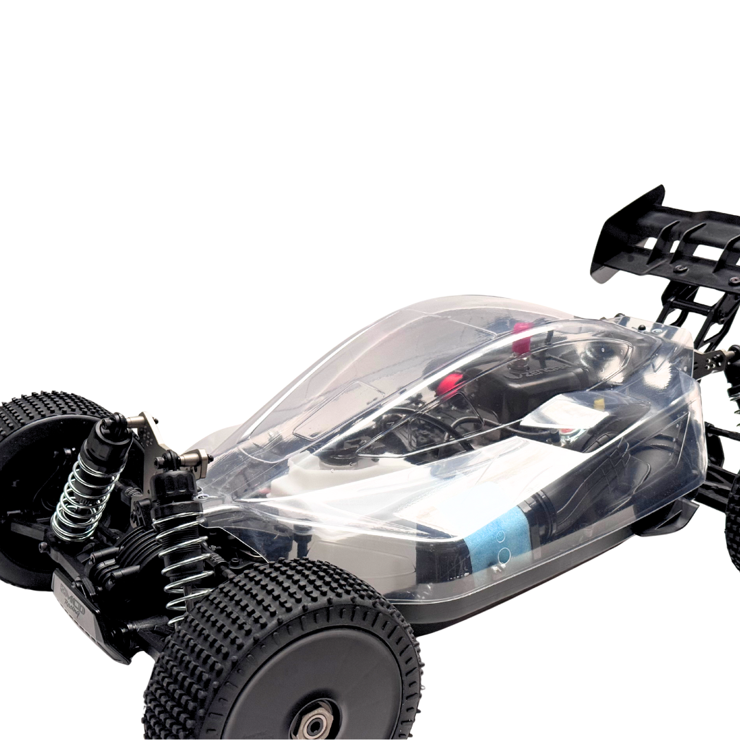 Black and transparent remote control car chassis on a white background