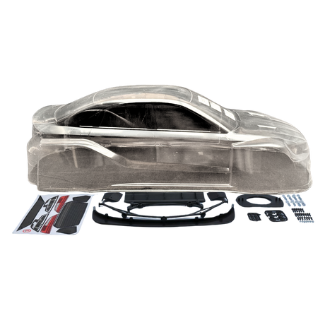 Clear plastic car body shell with black parts and accessories on a white background