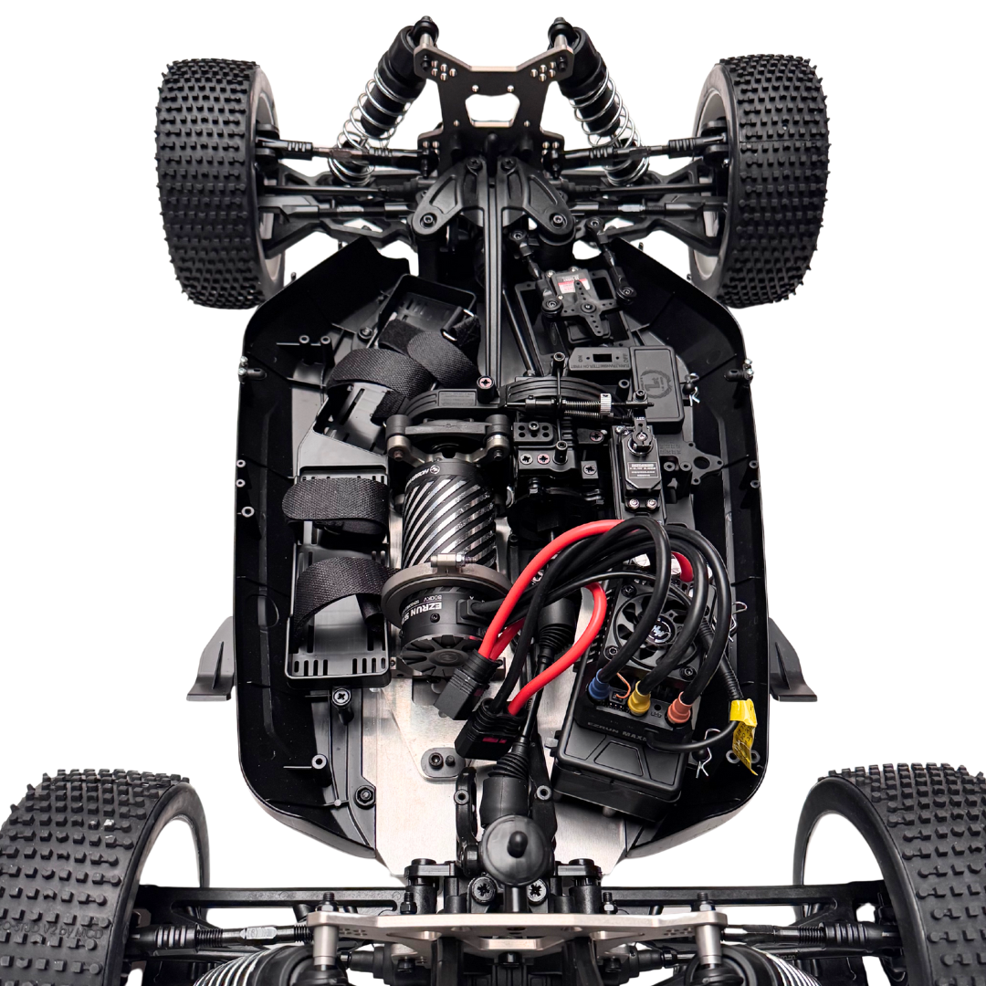 Close-up of a mechanical model of a vehicle with visible components on a white background