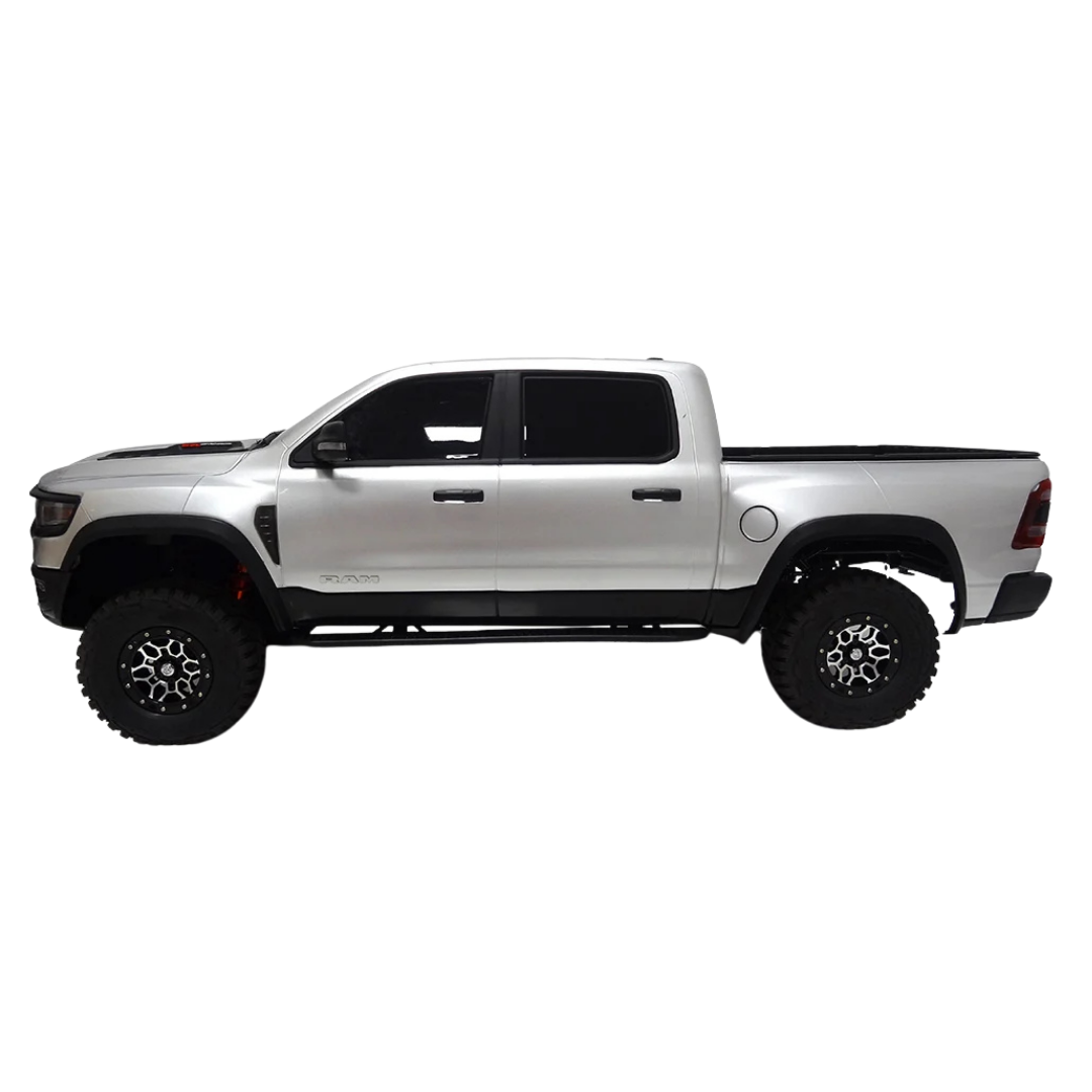 silver pickup truck with black accents on a white background