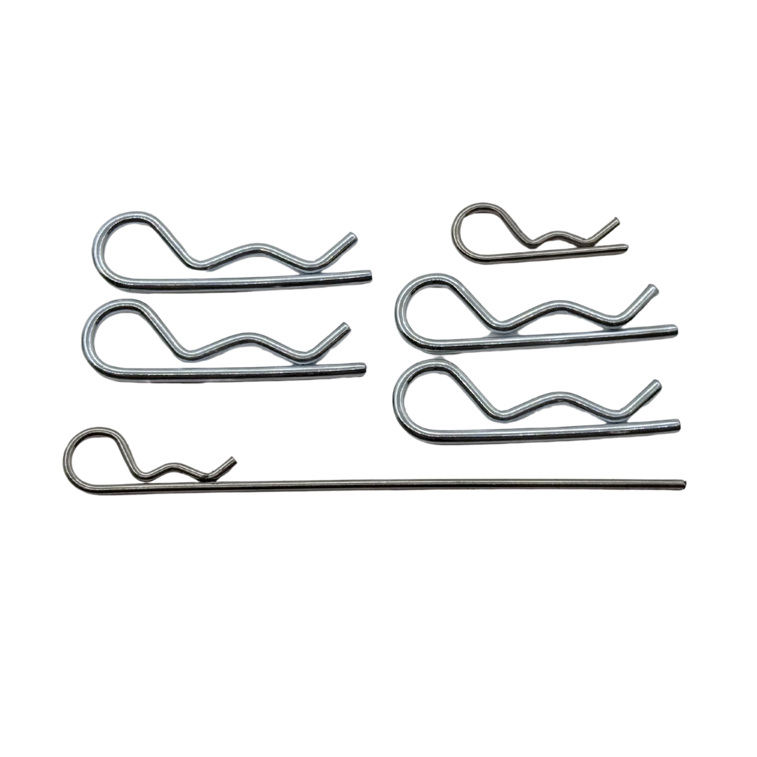 Set of metal spring clips on a white background