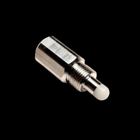 A metal piston stopper with a white tip, designed for use with Taylor Big Block engines.