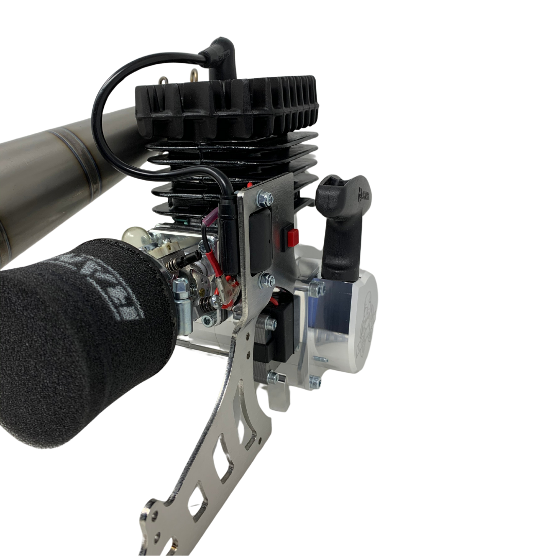 Close-up of a mechanical engine and air filter on a white background