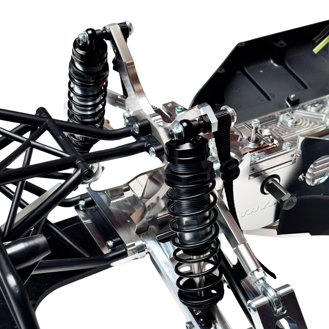 Taylor RC Complete Outlaw V4 Billet Hybrid Slider, close-up of the rear shock tower, shocks, and suspension arms