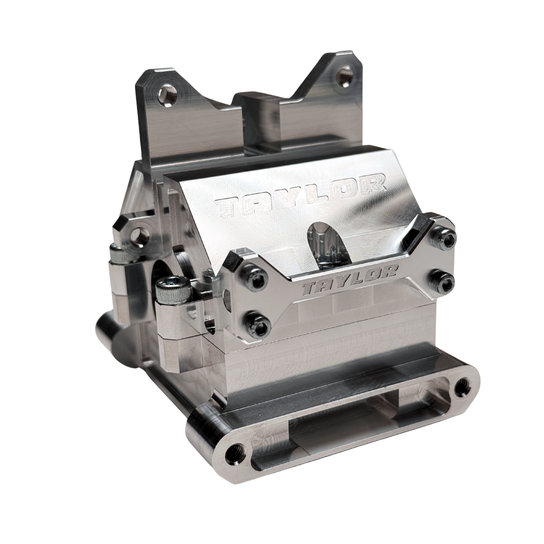 Metallic mechanical component with 'Taylor' branding on a white background