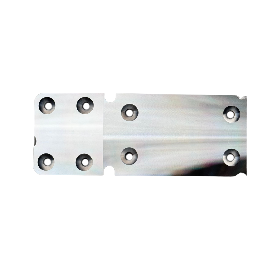 Taylor RC OUTLAW V4 front chassis insert in raw silver, top view of the counterbored face showing all six mounting holes