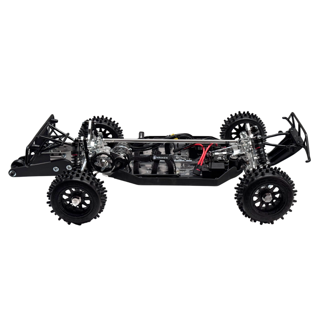 Black off-road vehicle chassis with visible mechanical components on a white background