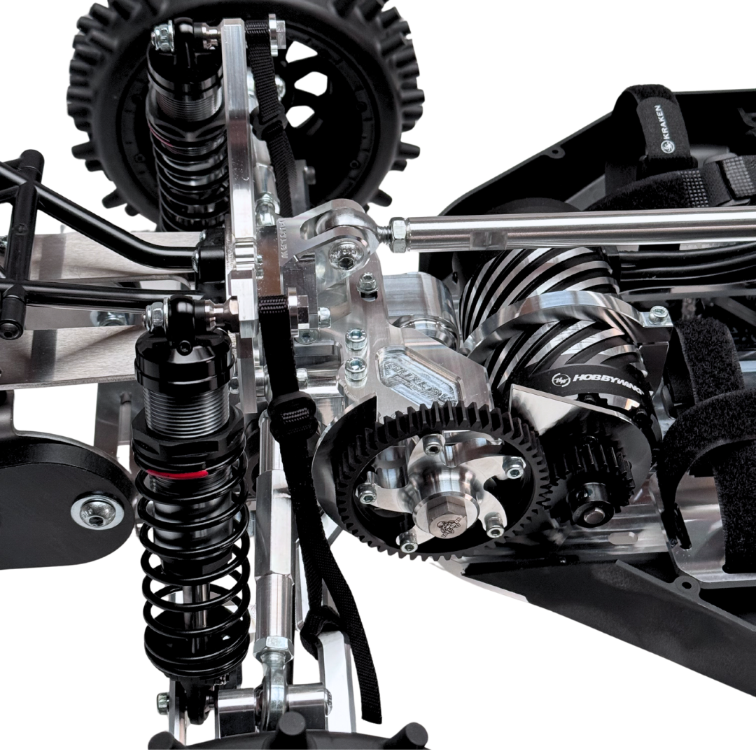 Close-up of a detailed mechanical system with gears and suspension components on a white background
