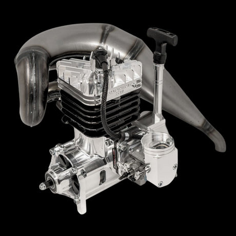 A TAYLOR 80cc RC car engine with silver and black coloring, including various components like the clutch system, ignition system, and throttle linkage.