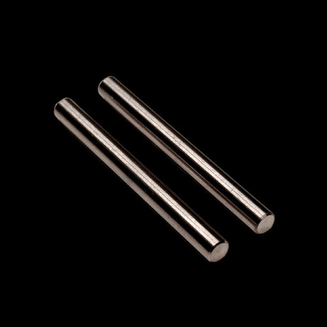 Two precision machined titanium hinge pins against a black background.