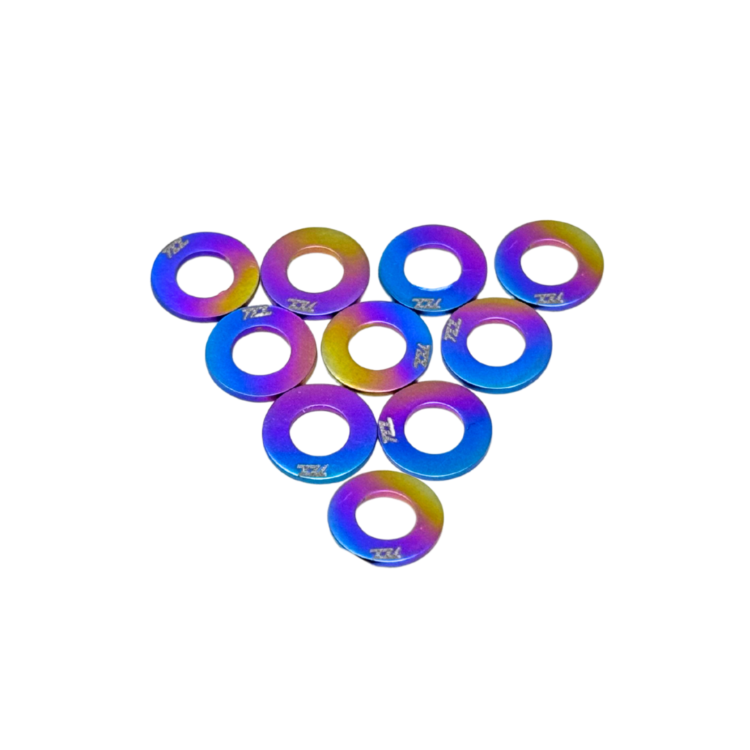 Set of colorful metallic washers on a white background