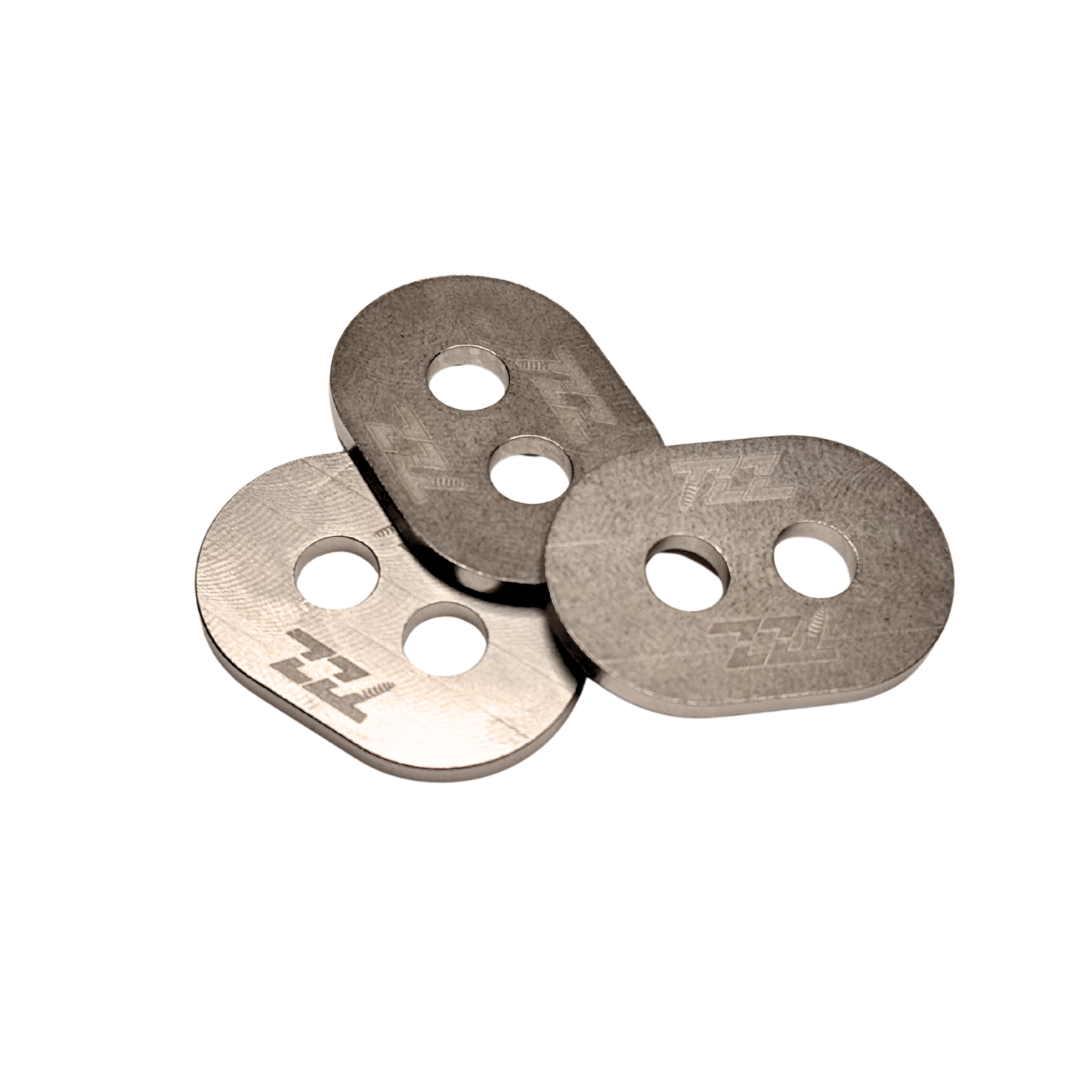 Three metal washers with a brand logo on a white background