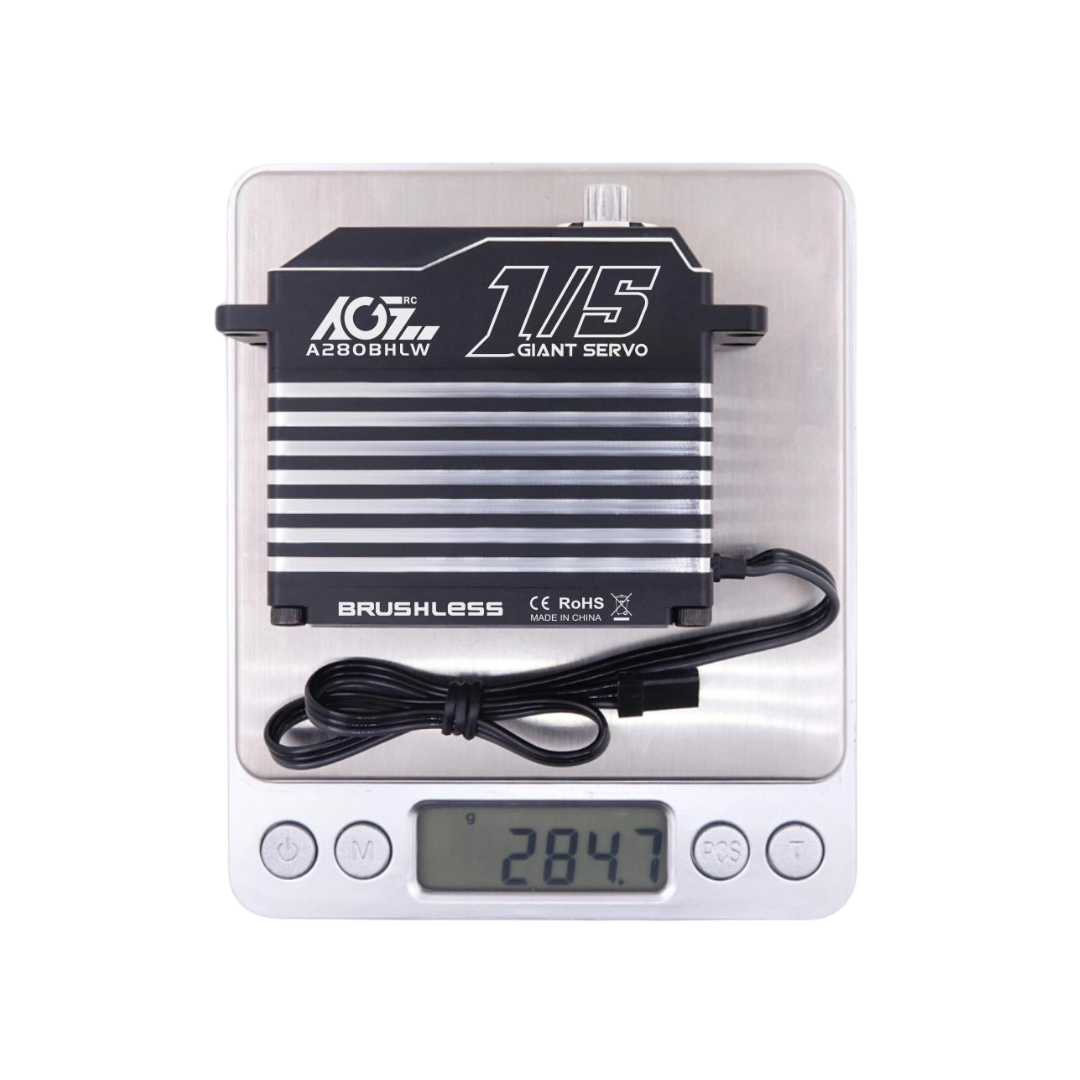 Servo on a digital scale displaying weight