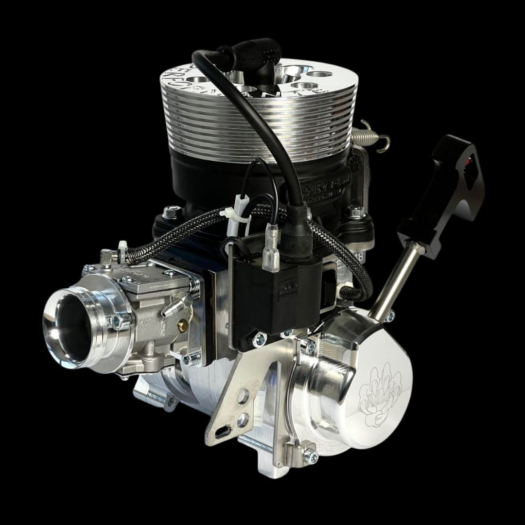 Engine block with various components on a black background