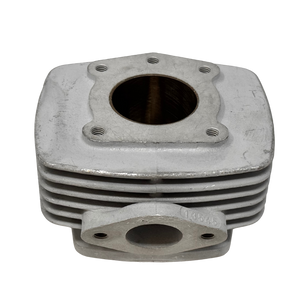 Metal engine cylinder head on a white background