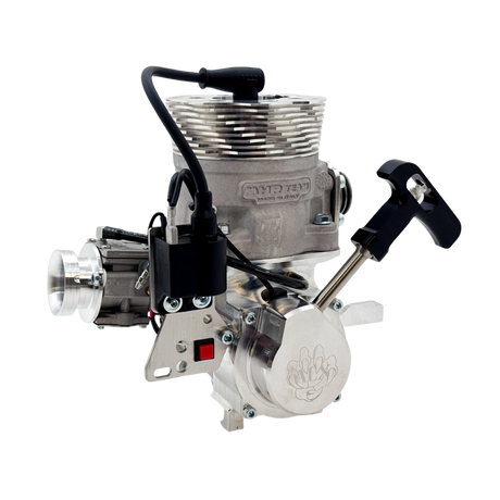 Metallic engine block with various components on a white background