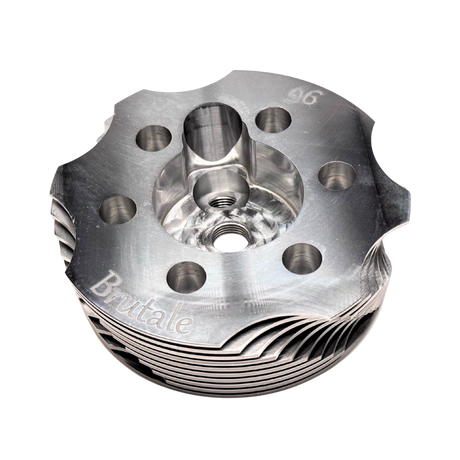 Metal engine cylinder head with 'Brutale' branding on a white background