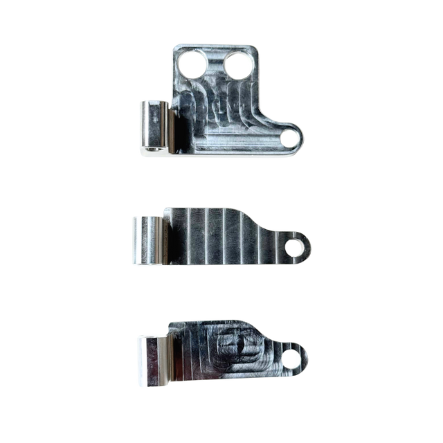 Three metal brackets on a white background
