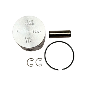 Engine piston, ring, and other components on a white background
