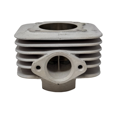 Metal engine cylinder block on a white background