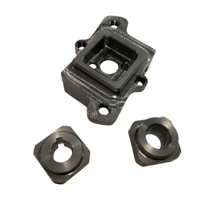 Three metal clutch components on a white background